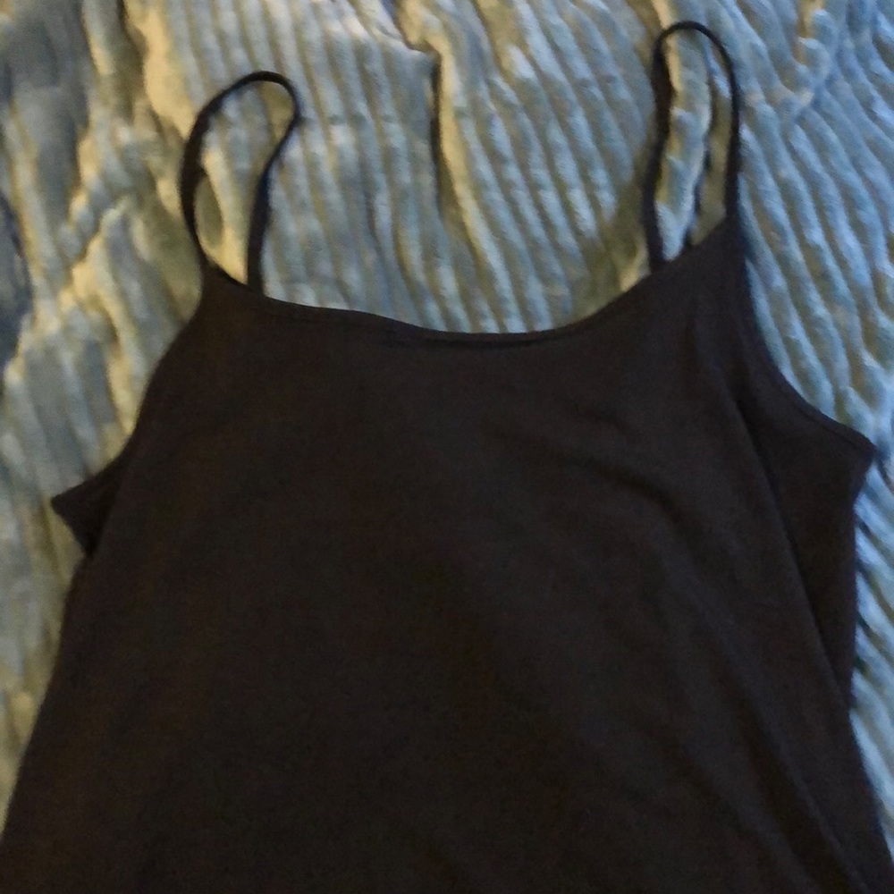 Black slip with lace on bottom of hem.